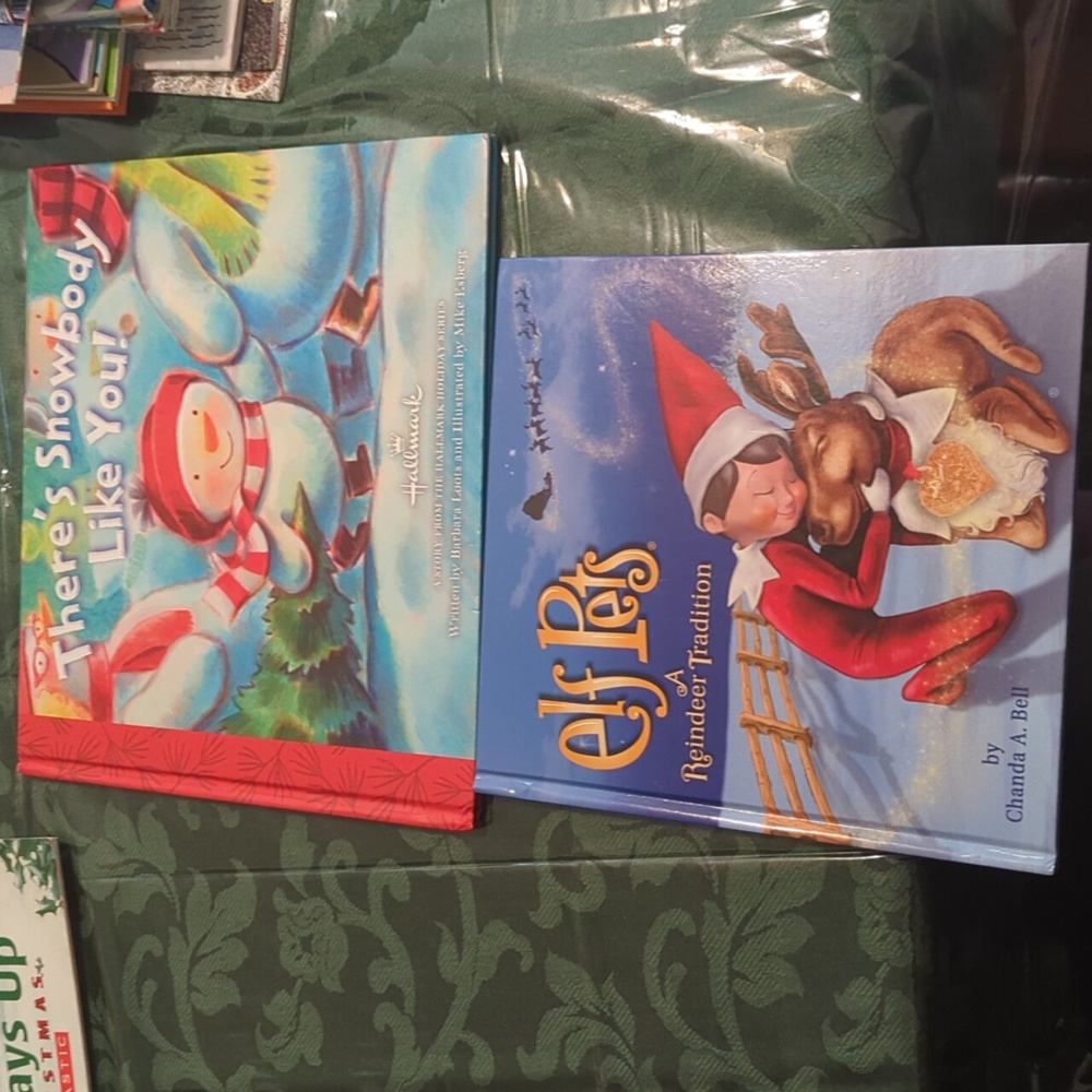 2  books Christmas books one is Hallmark